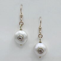 Freshwater Pearl Earrings with White Topaz Inlay by Val Nunns at The Avenue Gallery, a contemporary fine art gallery in Victoria, BC, Canada.