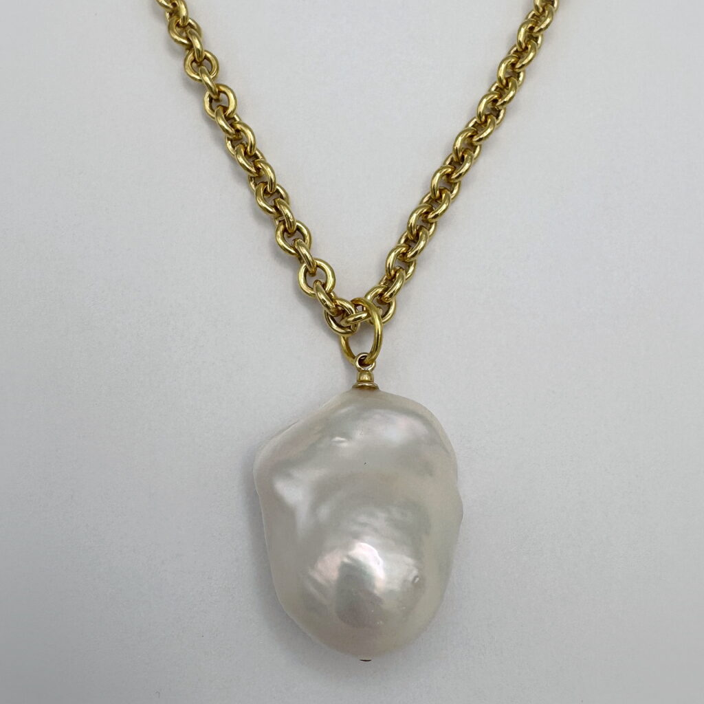 Large Baroque White Pearl on 4.3mm Oval Cable Gold-Filled Chain by Val Nunns at The Avenue Gallery, a contemporary fine art gallery in Victoria, BC, Canada.