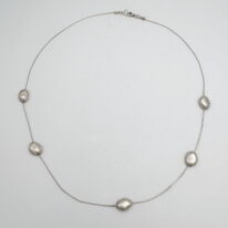Pebble Necklace by Air & Earth Design at The Avenue Gallery, a contemporary fine art gallery in Victoria, BC, Canada.