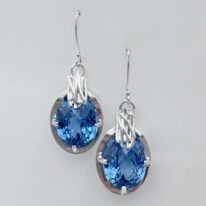 Twigs Earrings with London Blue Topaz by A & R Jewellery at The Avenue Gallery, a contemporary fine art gallery in Victoria, BC, Canada.