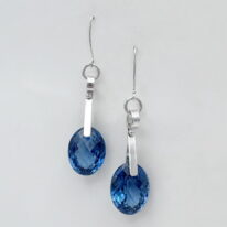 Wave Curl Earrings with London Blue Topaz by A & R Jewellery at The Avenue Gallery, a contemporary fine art gallery in Victoria, BC, Canada.