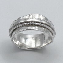 Hammered Spinner Ring by A & R Jewellery at The Avenue Gallery, a contemporary fine art gallery in Victoria, BC, Canada.