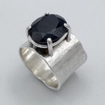 Wide Band Ring with Sapphire by A & R Jewellery at The Avenue Gallery, a contemporary fine art gallery in Victoria, BC, Canada.