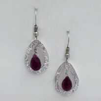 Medium Textured Teardrop Fine Silver Earrings with Rubies by Veronica Stewart at The Avenue Gallery, a contemporary fine art gallery in Victoria, BC, Canada.