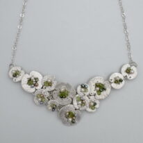 Fine Silver Lilypad Necklace with Peridot & Freshwater Pearls by Veronica Stewart at The Avenue Gallery, a contemporary fine art gallery in Victoria, BC, Canada.